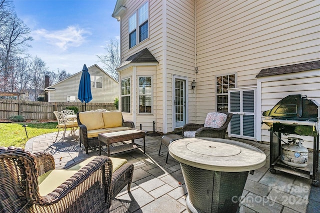 view of patio / terrace featuring a grill and an outdoor hangout area