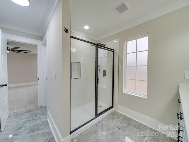 bathroom with ceiling fan, an enclosed shower, crown molding, and vanity