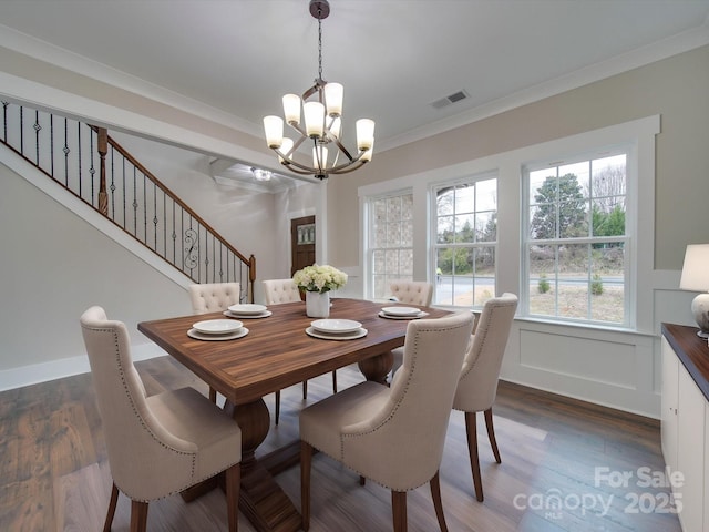 1304 Pleasant Plains Rd, Matthews, NC 28105 - dining space with a chandelier, stairs, crown molding, plenty of natural light, and dark wood finished floors