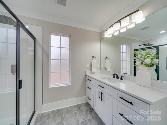 1304 Pleasant Plains Rd, Matthews, NC 28105 - bathroom with baseboards, vanity, a stall shower, and crown molding