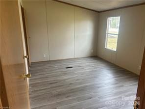 empty room featuring light hardwood / wood-style floors