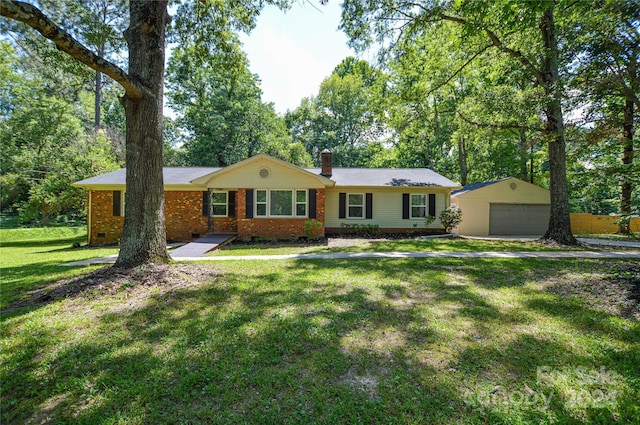 ranch-style house with a front lawn and a garage