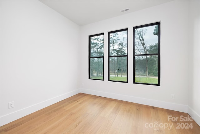 empty room with light wood-type flooring