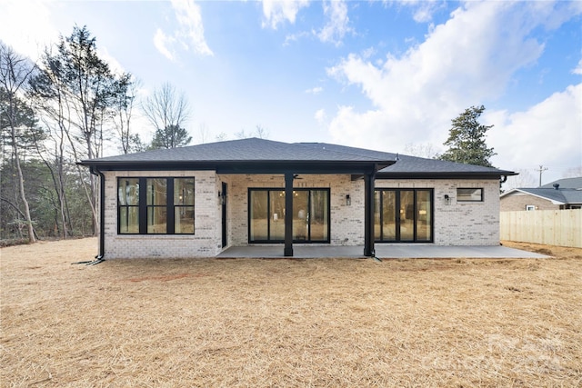 rear view of house with a patio area