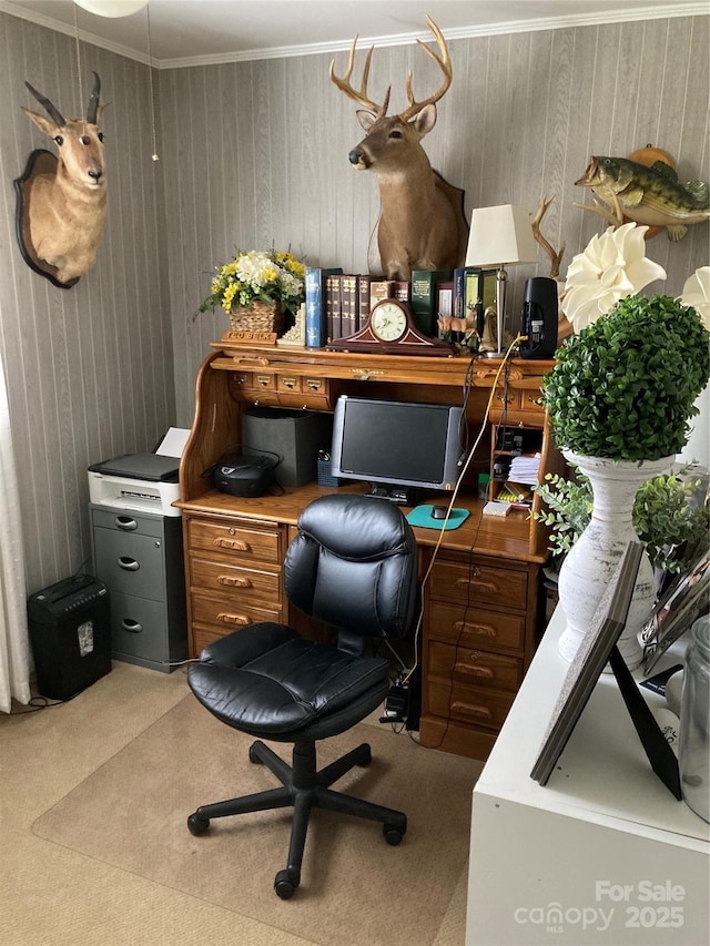 home office featuring ornamental molding, carpet, and wood walls