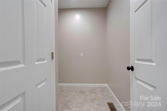 interior space featuring light tile patterned flooring