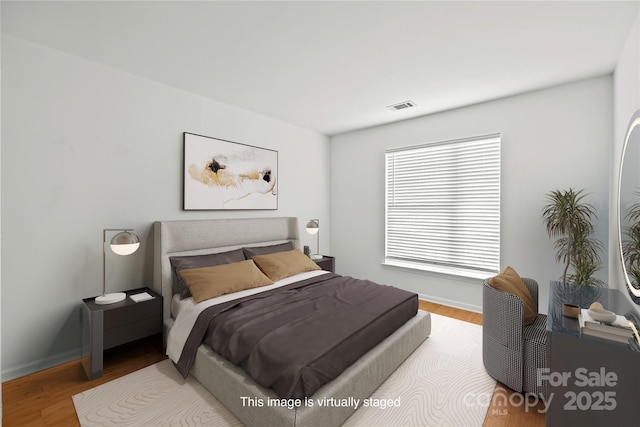 bedroom featuring light hardwood / wood-style flooring