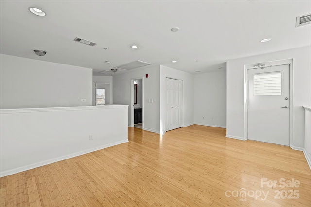 unfurnished room featuring light hardwood / wood-style flooring