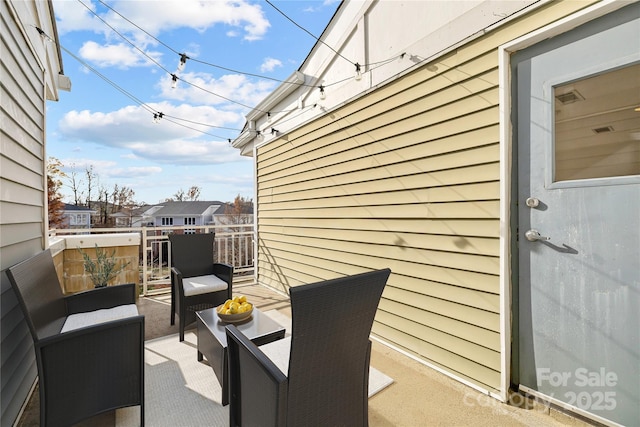 view of patio / terrace featuring outdoor lounge area and a balcony