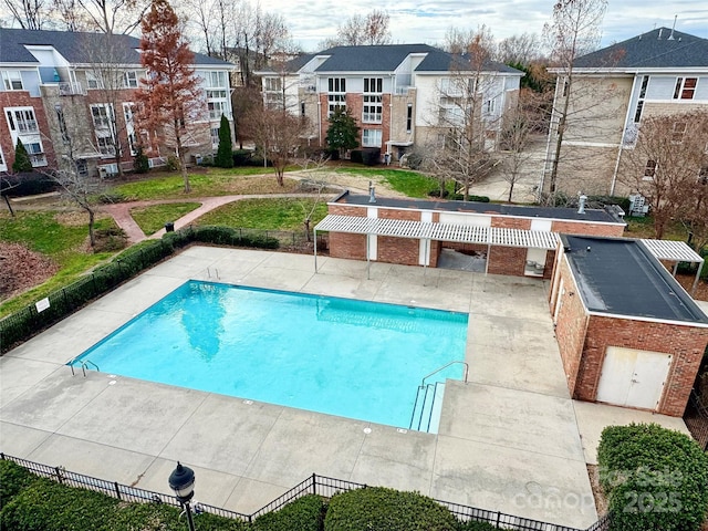 view of swimming pool with a pergola and a patio