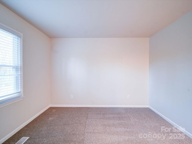 empty room with carpet floors