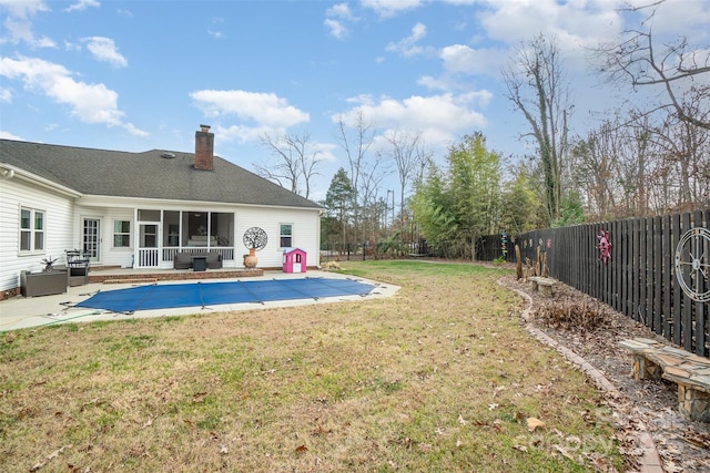 exterior space featuring a yard and a patio area