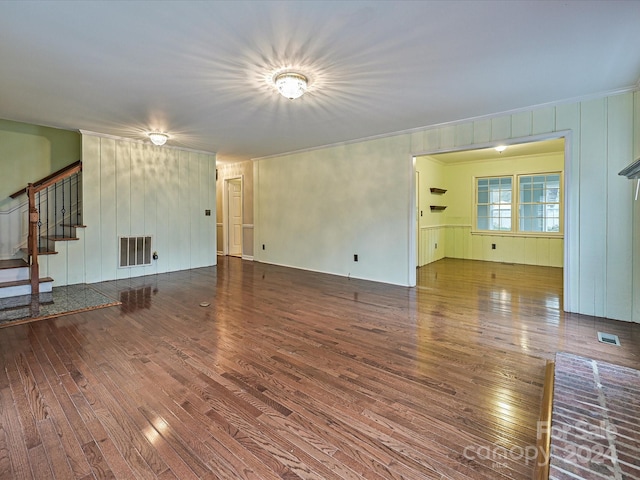 unfurnished living room featuring hardwood / wood-style floors