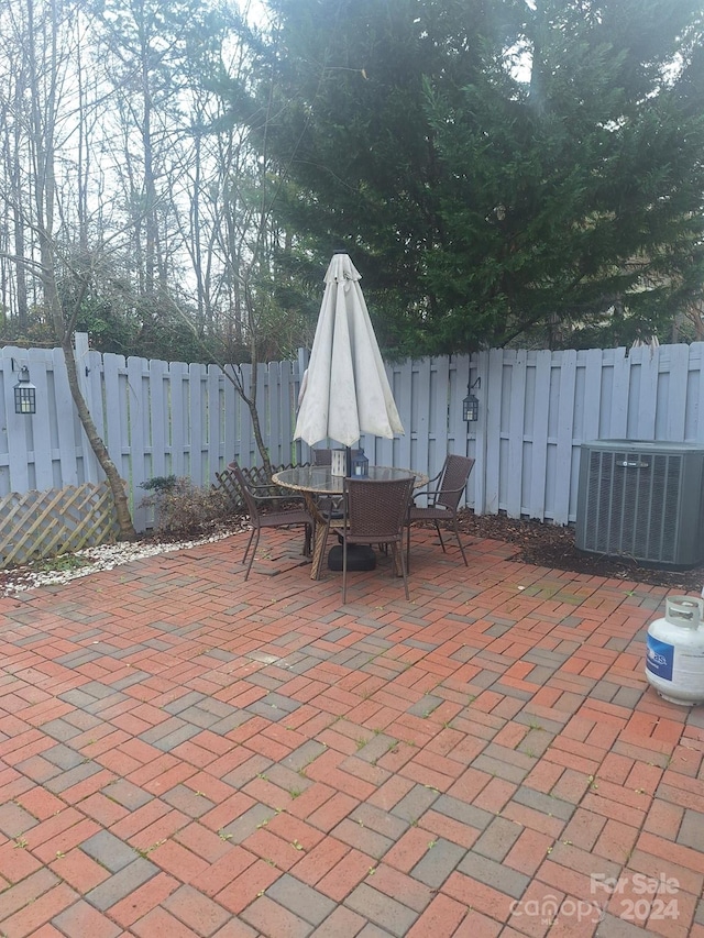 view of patio / terrace featuring cooling unit