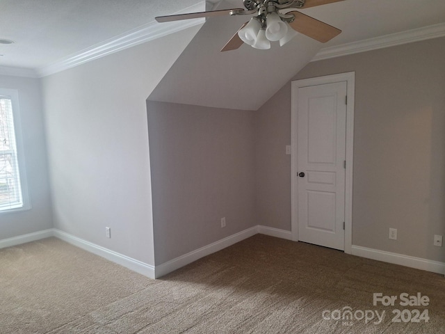 additional living space featuring carpet flooring, ceiling fan, and vaulted ceiling