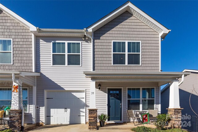 view of front of property with a garage