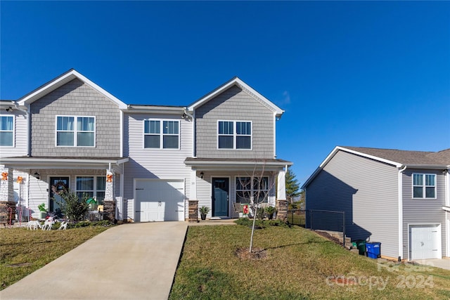 view of front of home with covered porch and a front yard