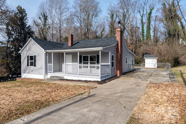 ranch-style house with covered porch