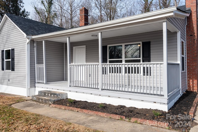 exterior space with covered porch