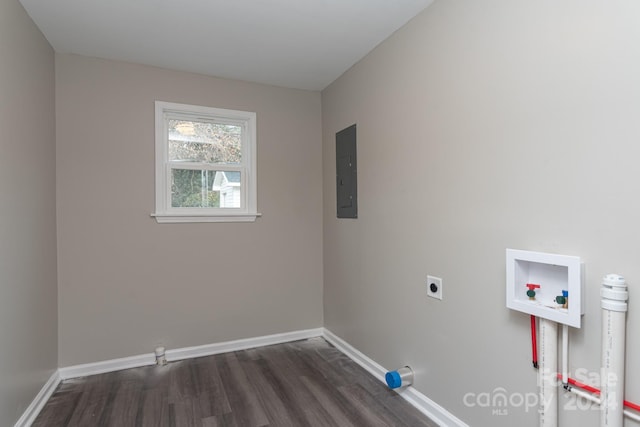 washroom with electric dryer hookup, electric panel, hookup for a washing machine, and dark hardwood / wood-style floors