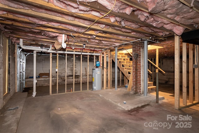 unfinished basement with water heater