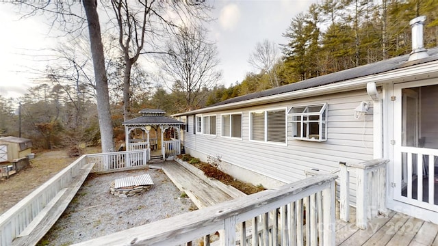 wooden deck featuring a gazebo