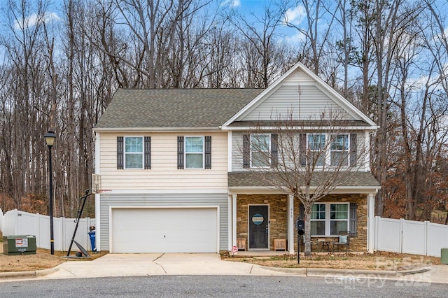 view of front of home with a garage