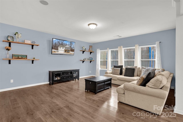 living room featuring dark hardwood / wood-style floors