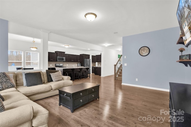 living room featuring dark hardwood / wood-style flooring