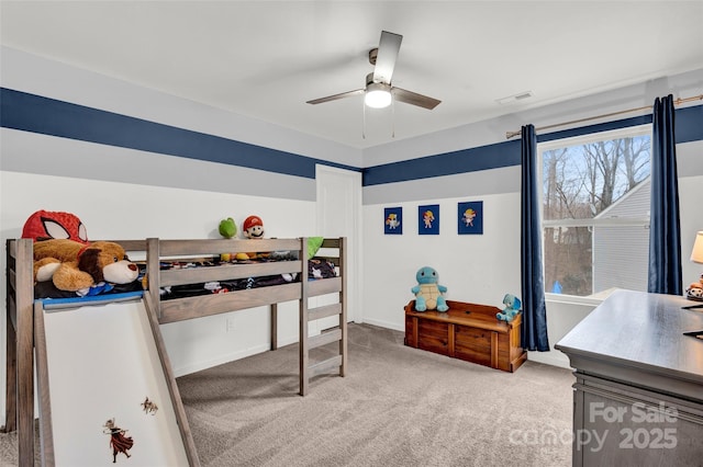 carpeted bedroom featuring ceiling fan