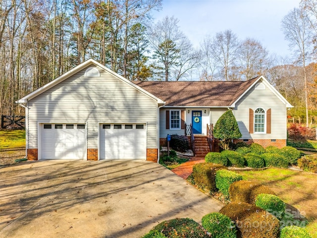 ranch-style home with a garage