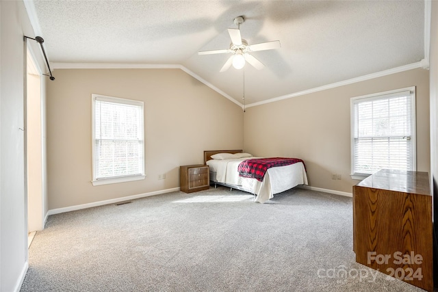 unfurnished bedroom featuring multiple windows, ceiling fan, and light colored carpet