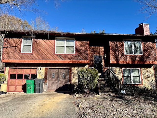 view of front of property with a garage