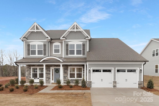 craftsman-style home featuring a garage and a porch