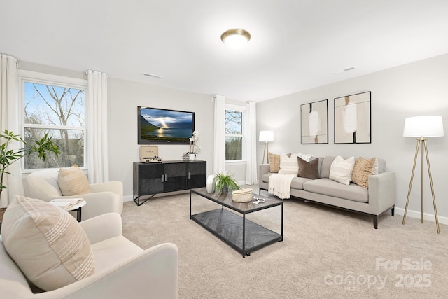 living room with light colored carpet