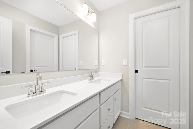 bathroom featuring vanity and tile patterned flooring