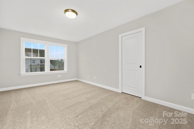 empty room with carpet floors