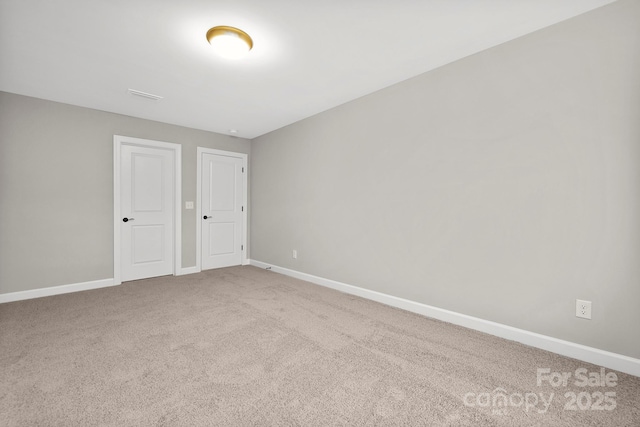 unfurnished bedroom with carpet floors