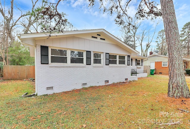 exterior space with a lawn