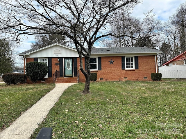 ranch-style home with a front yard