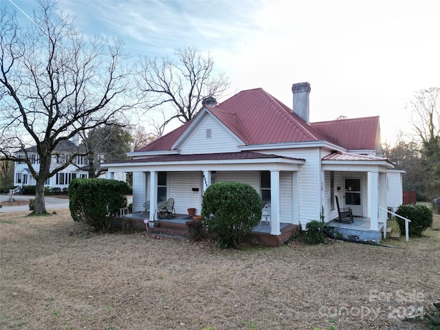 view of front of home featuring covered porch