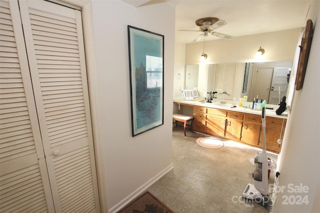 bathroom featuring vanity and ceiling fan