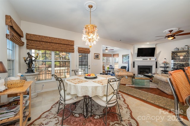 dining space featuring ceiling fan