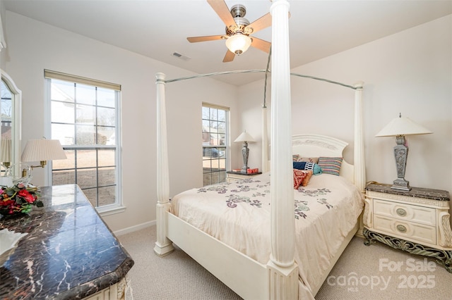 carpeted bedroom featuring ceiling fan