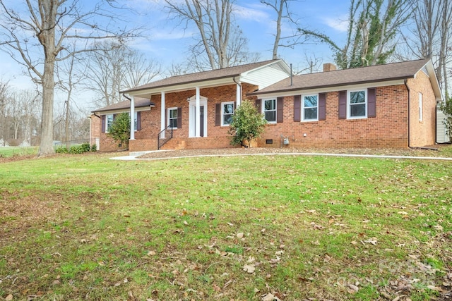 ranch-style house featuring a front lawn