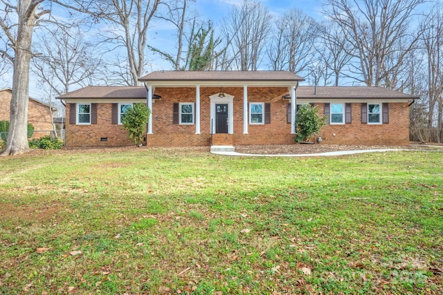 single story home featuring a front lawn