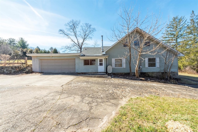 view of front of house featuring a garage and driveway