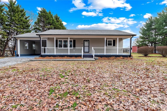 single story home with a carport