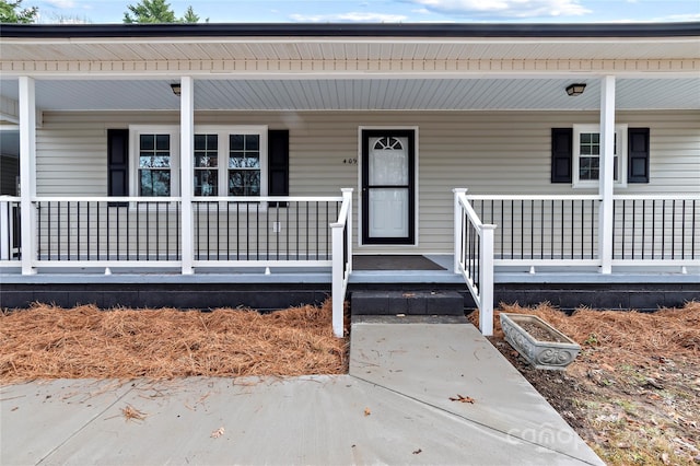 entrance to property with covered porch