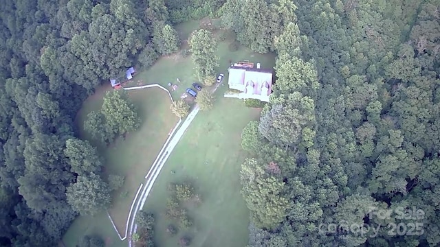 aerial view featuring a forest view